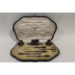 A CASED MAPPIN & WEBB HALLMARKED SILVER AND TORTOISESHELL MANICURE SET - BIRMINGHAM 1915, with pique