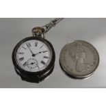 A HALLMARKED SILVER FOB WATCH ON CHAIN TOGETHER WITH A COIN