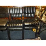 A SET OF MODERN BLACK LEATHERETTE METAL CHAIRS