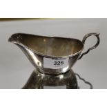 A HALLMARKED SILVER SAUCE BOAT A/F