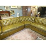 A LARGE RETRO LEATHER STYLE CORNER SOFA