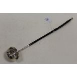 A HALLMARKED SILVER WHALE BONE HANDLED TODDY LADLE WITH INSET COIN TO BOWL - GLASGOW 1825, L 43 cm