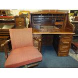 AN ANTIQUE OAK TWIN PEDESTAL ROLL-TOP DESK H-128 W-121 D-81 CM WITH ARMCHAIR