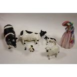 A BESWICK FRESIAN CATTLE TRIO, TOGETHER WITH A ROYAL DOULTON FIGURE AND A BESWICK SHEEP, ALL A/F