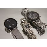 A GUESS COLLECTION WRIST WATCH TOGETHER WITH A STORM EXAMPLE AND ANOTHER A/F