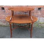 AN EDWARDIAN MAHOGANY SHERATON REVIVAL ETAGERE, with two oval tiers crossbanded with satinwood, W 89