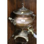 A VINTAGE SAMOVAR WITH HOUND FINIAL