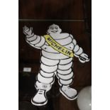 ***A MODERN CAST METAL MICHELIN MAN SHAPED PLAQUE*