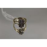 A HALLMARKED 9 CARAT GOLD RING, set with lilac and clear stones, ring size N 1/2