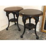 A PAIR OF WOODEN CAST BASE CIRCULAR PUB TABLES H-70 DIA -58 CM