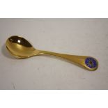 A GEORG JENSEN SILVER GILT AND ENAMEL SPOON