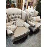 A PAIR OF MODERN UPHOLSTERED WINGBACK ARMCHAIRS (2)