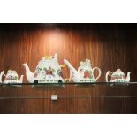 FOUR PORTMEIRION 'GODDESS OF FRUIT' NOVELTY TEAPOTS