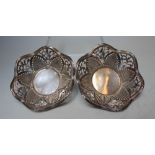 A DECORATIVE PAIR OF EDWARDIAN HALLMARKED SILVER DISHES - LONDON 1908, scalloped edge, pierced