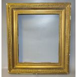 A LATE 18TH / EARLY 19TH CENTURY GILT FRAME, with egg and dart decoration to inner edge of frame,