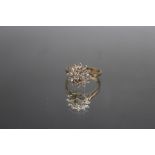 A HALLMARKED 9 CARAT GOLD ILLUSION SET DIAMOND CLUSTER RING, ring size S