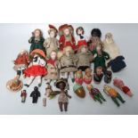 A COLLECTION OF TEN MINIATURE PORCELAIN DOLLS, varying period clothing, average H 9.5 cm, together