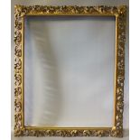 A LATE 19TH / EARLY 20TH CENTURY GILT GESSO FLORENTINE FRAME, frame W 5 cm, rebate size 57 x 46 cm