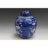 A CHINESE TYPE LARGE PRUNUS GINGER JAR AND COVER, H 26 cm