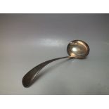 A HALLMARKED SILVER SERVING LADLE - SHEFFIELD 1909, L 29 cm