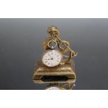 A BRASS DRAGON POCKET WATCH STAND WITH SILVER PLATED POCKET WATCH, H 11 cm