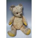 AN EARLY / MID 20TH CENTURY VINTAGE MOHAIR TEDDY BEAR A/F, fully jointed, H 60 cm