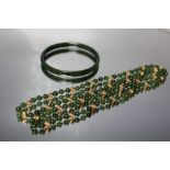 A SPINACH JADE AND YELLOW METAL HAND KNOTTED SINGLE STRAND BEAD NECKLACE, approx L 80 cm, together