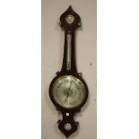 A ROSEWOOD ARTS AND CRAFTS WALL HANGING BAROMETER, by W. Cooke, Keighley, H 104 cm