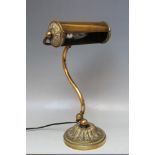 AN EARLY 20TH CENTURY FRENCH ADJUSTABLE BRASS BANKERS / DESK LAMP, having ornate circular base, Dia.