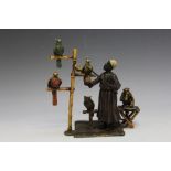 AN AUSTRIAN COLD PAINTED BRONZE FIGURE OF A NORTH AFRICAN GENTLEMAN AND HIS ANIMALS, with a