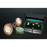 A 9CT MOUNTED CAMEO BROOCH, together with a 9ct mounted Jade brooch a/f, a 9ct amethyst brooch a/f