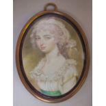 (XIX). British school, oval portrait miniature on ivory of a young woman with white dress and head