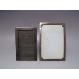 TWO GEORGE V HALLMARKED SILVER RECTANGULAR PICTURE FRAMES, of plain form, tallest H 16.5 cm (2)