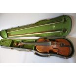 A CASED ANTIQUE VIOLIN FOR RESTORATION, length of back 13 7/8", together with two bows