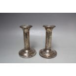 A PAIR OF HALLMARKED SILVER CANDLESTICKS - BIRMINGHAM 1905, with swags and tail decoration, engraved