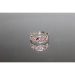 A 9 CARAT WHITE GOLD PINK SAPPHIRE AND DIAMOND RING, ring size O