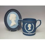 A WEDGWOOD BLUE BASALT OVAL WALL PLAQUE DEPICTING A PORTRAIT OF H.M.QUEEN ELIZABETH II, impressed