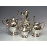 A GOOD QUALITY 4 PC SILVER PLATED TEA AND COFFEE SET, ornate styling, comprising a tea pot, coffee