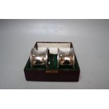 A CASED SET OF TWO HALLMARKED SILVER NAPKIN RINGS - BIRMINGHAM 1923