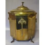 AN EARLY 20TH CENTURY BRASS COAL BOX, raised on four cast feet, original liner, H 41 cm