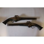 A PAIR OF 17TH CENTURY TYPE HANDMADE WHEELOCK PISTOLS, with opposing locks, with ramrods, overall
