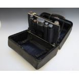 A MAPPIN BROTHERS TRAVELLING VANITY CASE, having automatic rising central section on opening and