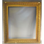 A 19TH CENTURY DECORATIVE GILT FRAME, with acanthus leaf design to edge and slip, frame W 10 cm,