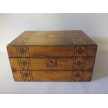 A 19TH CENTURY WALNUT AND INLAID STATIONARY BOX, the hinged lid opening to a part fitted interior,