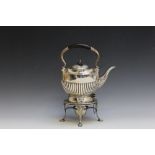 A HALLMARKED SILVER SPIRIT KETTLE - CHESTER 1909, of typical half read form, approx weight 1370g,