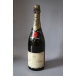 AN OLD BOTTLE OF MOET & CHANDON