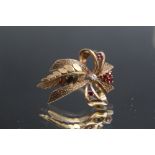 A HALLMARKED 9 CARAT GOLD DIAMOND & RUBY SET BROOCH, approx weight 7.3g, W 2.5 cm