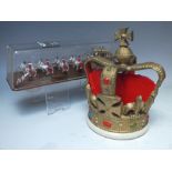 AN UNUSUAL CAST MODEL OF A CROWN, H 24 cm, together with a Crescent Toys Royal Stage Coach &