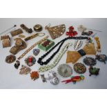 A COLLECTION OF VINTAGE COSTUME JEWELLERY ETC, various styles and periods, to include brooches,