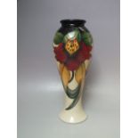 A MOORCROFT 'ANNA LILY' PATTERN FLARED VASE, tubeline decoration, impressed and painted marks to